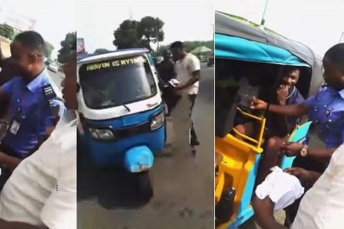 Nigerian police officer stops tricycle, gives money to rider and passengers for Christmas (video)