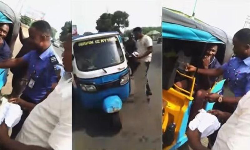 Nigerian police officer stops tricycle, gives money to rider and passengers for Christmas (video)