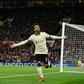 Mohamed Salah celebrates after scoring Liverpool's fifth goal, and his third, at Old Trafford
