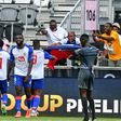 Haiti's players celebrate a goal against Saint Vincent and the Grenadines in the Gold Cup preliminaries. Five players and a coach have tested positive for Covid-19 but the team will remain in the competition