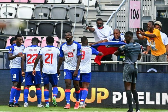 Haiti's players celebrate a goal against Saint Vincent and the Grenadines in the Gold Cup preliminaries. Five players and a coach have tested positive for Covid-19 but the team will remain in the competition