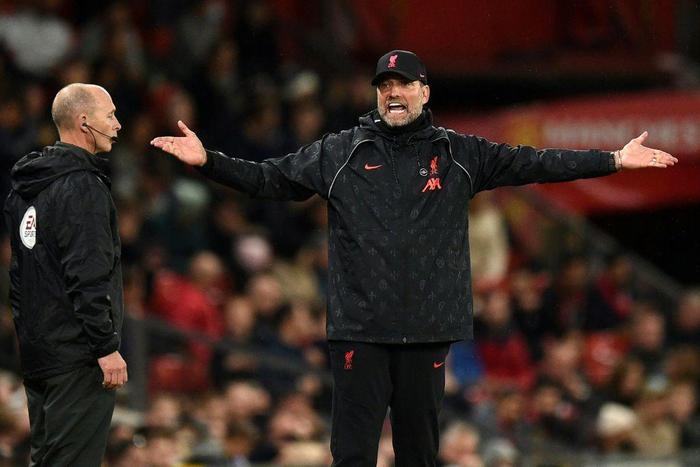 Protest: Jurgen Klopp contests a decision at Old Trafford