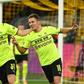 Thorgan Hazard (R) celebrates scoring for Dortmund on Tuesday in the German Cup