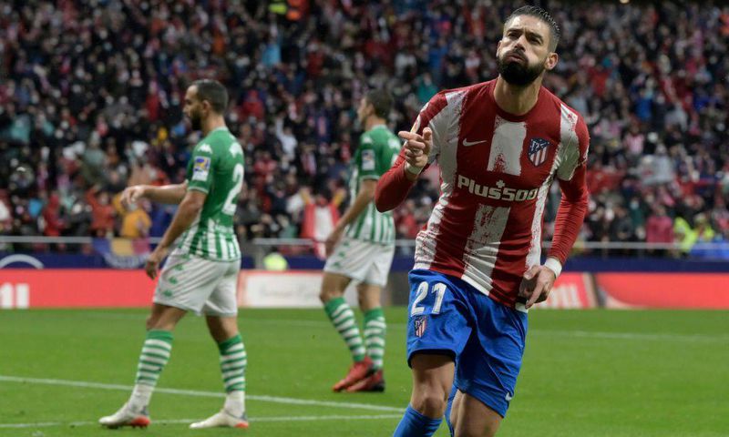 Yannick Carrasco celebrates giving Atletico Madrid the lead against Real Betis