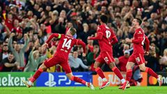 Jordan Henderson (left) celebrates scoring Liverpool's winner against AC Milan