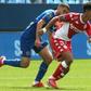 Monaco's Sofiane Diop escaping Oualid El Hajjam of Troyes