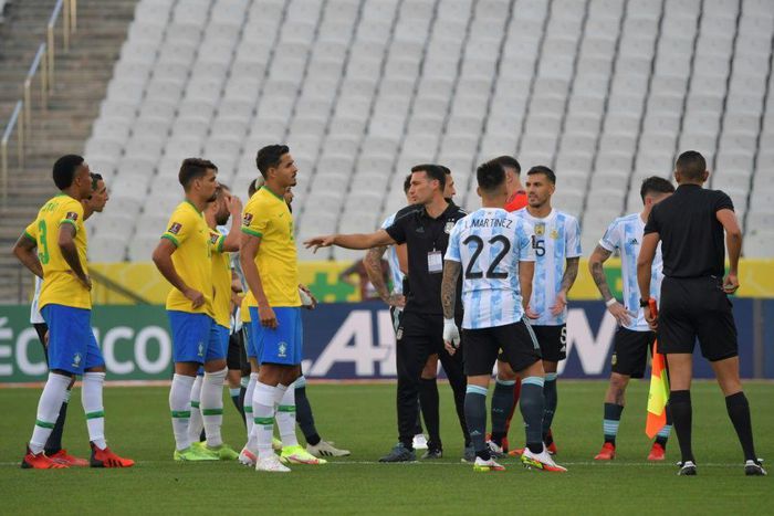 Brazil and Argentina players were left confused after Brazilian health officials ran onto the pitch shortly after kick-off