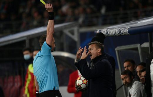 Leipzig head coach Jesse Marsch shows his frustration after being booked by Swedish referee Andreas Ekberg