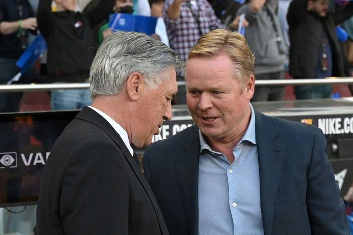 Ronald Koeman (right) greets Real Madrid coach Carlo Ancelotti before the Clasico on Sunday