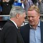 Ronald Koeman (right) greets Real Madrid coach Carlo Ancelotti before the Clasico on Sunday