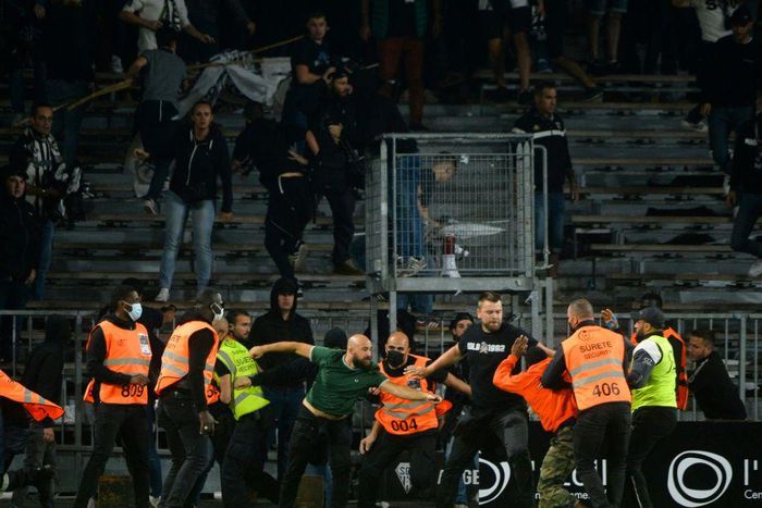 Marseille supporters clashed with opposing supporters and security staff at Angers' stadium