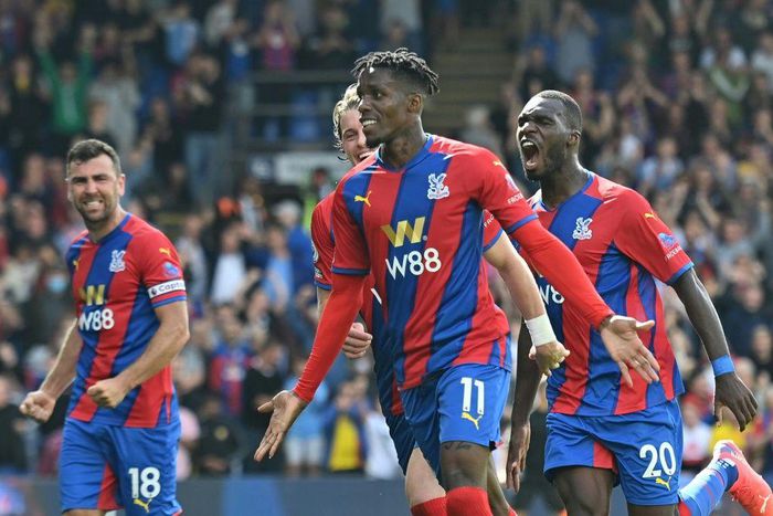 Crystal Palace's Wilfried Zaha (C) celebrates scoring against Tottenham