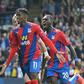 Crystal Palace's Wilfried Zaha (C) celebrates scoring against Tottenham