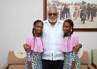 Lydia and Linda Awui, first conjoined twins separated in Ghana vist Rawlings