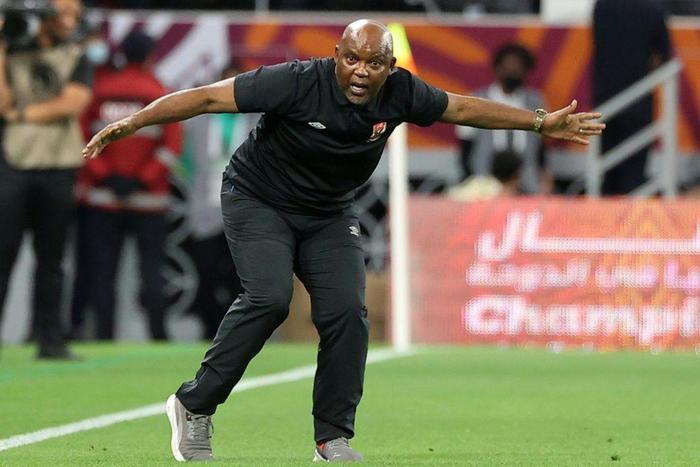 Al Ahly of Egypt coach Pitso Mosimane reacts during the CAF Super Cup match against Raja Casablanca of Morocco in Qatar on December 22.
