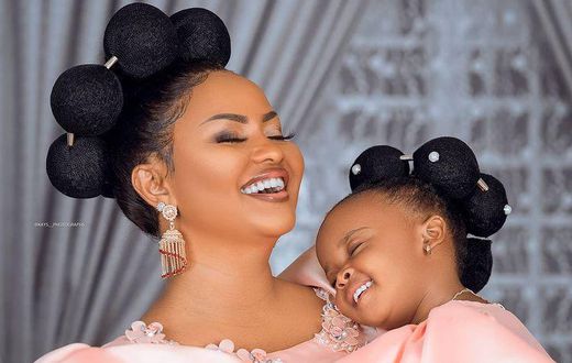 Nana Ama McBrown and baby Maxin