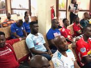 Thomas Freeman (in Real Madrid shirt) watching football with friends