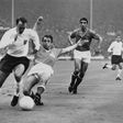 Former England striker Jimmy Greaves, seen here playing against France in the 1966 World Cup, has died aged 81