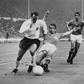 Former England striker Jimmy Greaves, seen here playing against France in the 1966 World Cup, has died aged 81