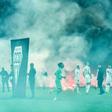 Under fire:Saint-Etienne and Angers players swathed in smoke as kick off was delayed in their Ligue 1 game