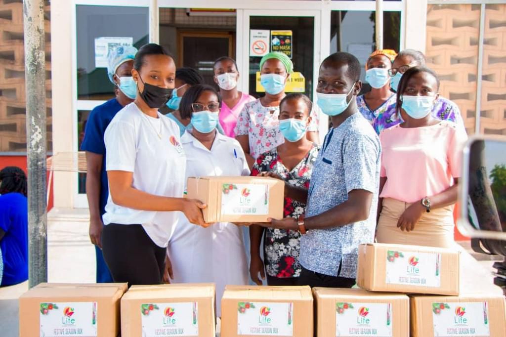 Stephanie Karikari celebrates with mothers at Winneba Municipal Hospital