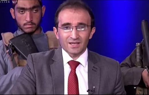 Armed Taliban militants storm TV studio, surround presenter with guns while he reads news