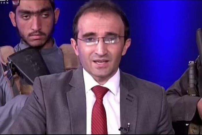 Armed Taliban militants storm TV studio, surround presenter with guns while he reads news