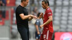 Bayern Munich coach Julian Nagelsmann (L) says Leroy Sane (R) is better off playing on the left wing