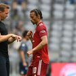 Bayern Munich coach Julian Nagelsmann (L) says Leroy Sane (R) is better off playing on the left wing