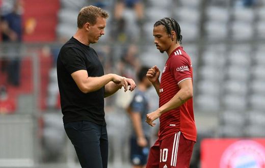Bayern Munich coach Julian Nagelsmann (L) says Leroy Sane (R) is better off playing on the left wing