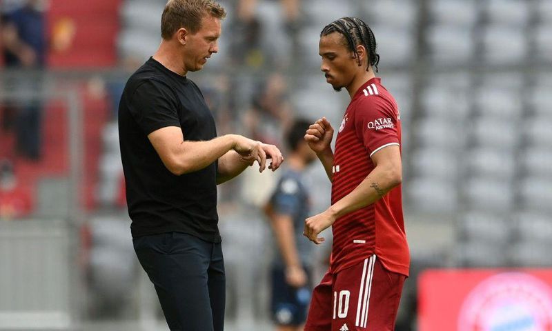 Bayern Munich coach Julian Nagelsmann (L) says Leroy Sane (R) is better off playing on the left wing