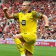 Erling Braut Haaland celebrates scoring against Leverkusen on Saturday