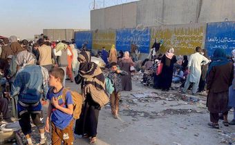 People who want to flee the country continue to wait around Hamid Karzai International Airport in Kabul, Afghanistan on August 25, 2021.