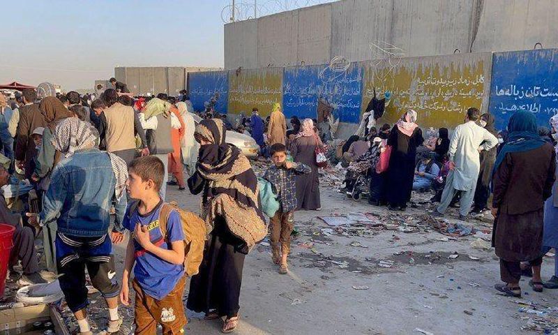 People who want to flee the country continue to wait around Hamid Karzai International Airport in Kabul, Afghanistan on August 25, 2021.
