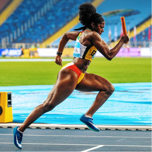 Gemma Achampong beginning the race for Ghana’s women’s 4×100 relay race at the ‘Silesia 21’