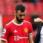 Manchester United boss Ole Gunnar Solskjaer consoles Bruno Fernandes after he missed a penalty in United's 1-0 defeat by Aston Villa