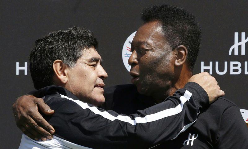 Football legends Diego Maradona (L) and Pele are seen together in 2016