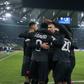 Lille players celebrate during their win over Wolfsburg on Wednesday