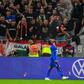 Hungary fans react throwing cups of beer at England forward Raheem Sterling