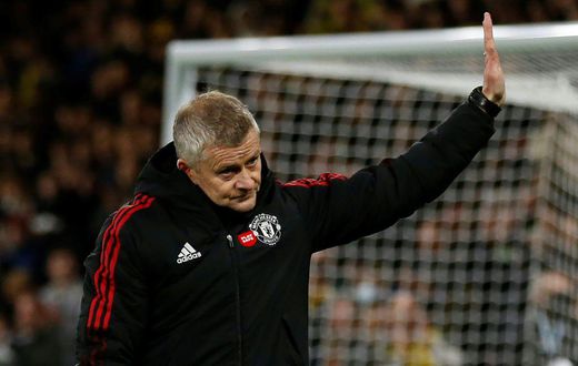 Is this goodbye? Ole Gunnar Solskjaer waves to Manchester United supporters after the 4-1 defeat at Watford on Saturday. The fans reacted by booing the manager