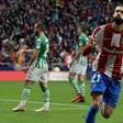 Yannick Carrasco celebrates giving Atletico Madrid the lead against Real Betis