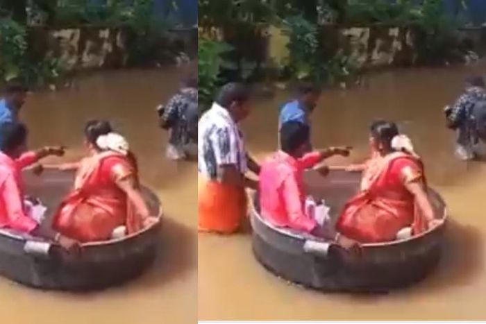 Bride & groom float in a cooking pot to wedding as flooding kills 27 people (video)