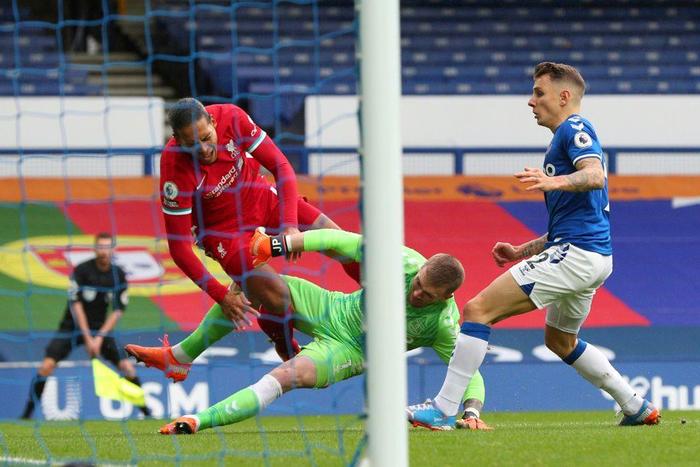Virgil van Dijk (left)will face Everton for the first time since suffering cruciate ligament damage at Goodison Park 13 months ago