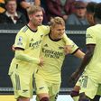Martin Odegaard (centre) celebrates after scoring for Arsenal against Burnley