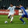 Che Adams (left) scored as Scotland secured a 2022 World Cup qualifying playoff in Moldova