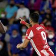 Luis Suarez (R) scored a late double for Atletico