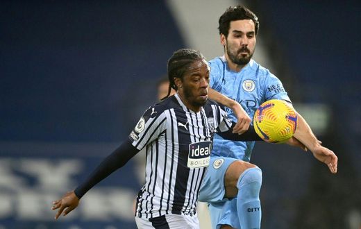 Racially abused: West Bromwich Albion's Romaine Sawyers (L)