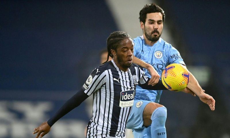 Racially abused: West Bromwich Albion's Romaine Sawyers (L)