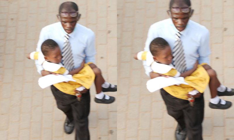 Group to buy car for father who went viral for carrying his daughter during drivers’ strike