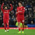 Derby delight: Mohamed Salah (left)scored twice as Liverpool beat Everton
